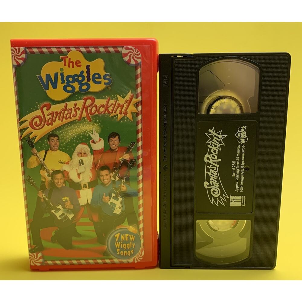 THE WIGGLES SANTA’S ROCKIN’! CHRISTMAS SONGS MUSICAL VHS VIDEO TAPE CLAMSHELL